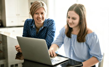 K12 is the Expert image 2 (name mother daughter laptop kitchen)