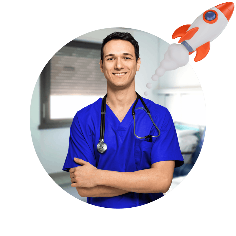 A male doctor in blue scrubs wearing a playful rocket hat, symbolizing creativity and innovation in healthcare.