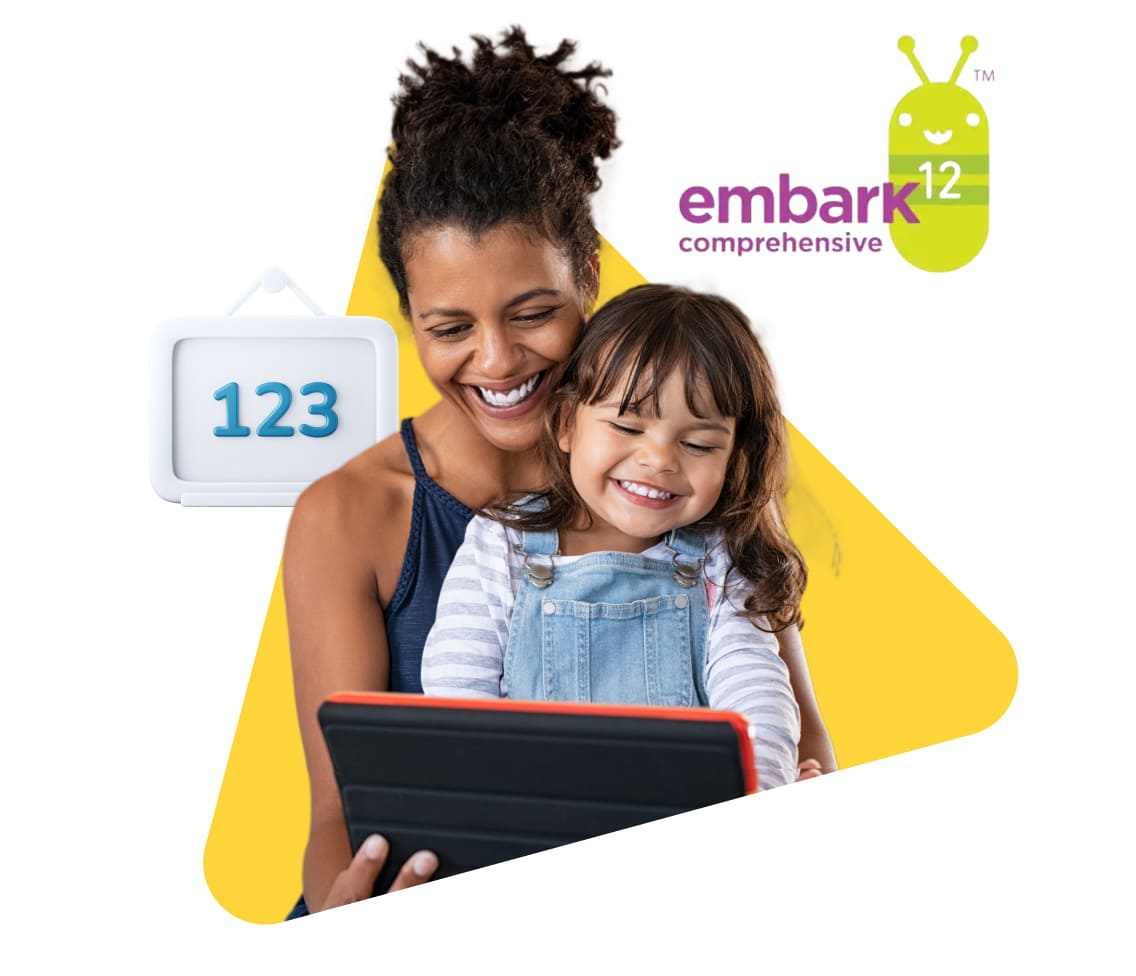A woman and child are engaged with a tablet displaying the word "embark," showcasing a moment of shared learning.
